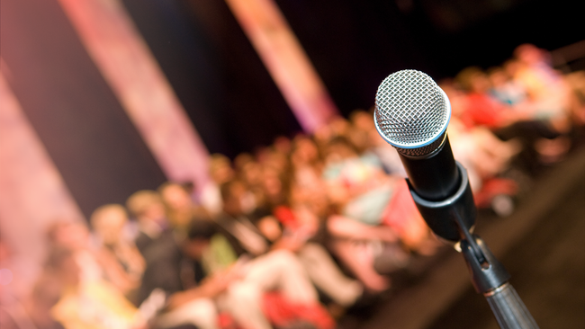 microphone in front of a crowd